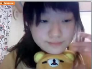 Asiatique université étudiant avec grand seins sur webcam